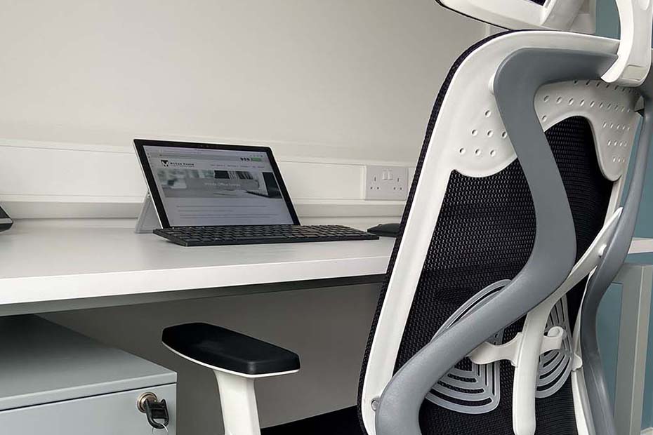 Desk, ergonomic chair and Microsoft Surface - Decorative
