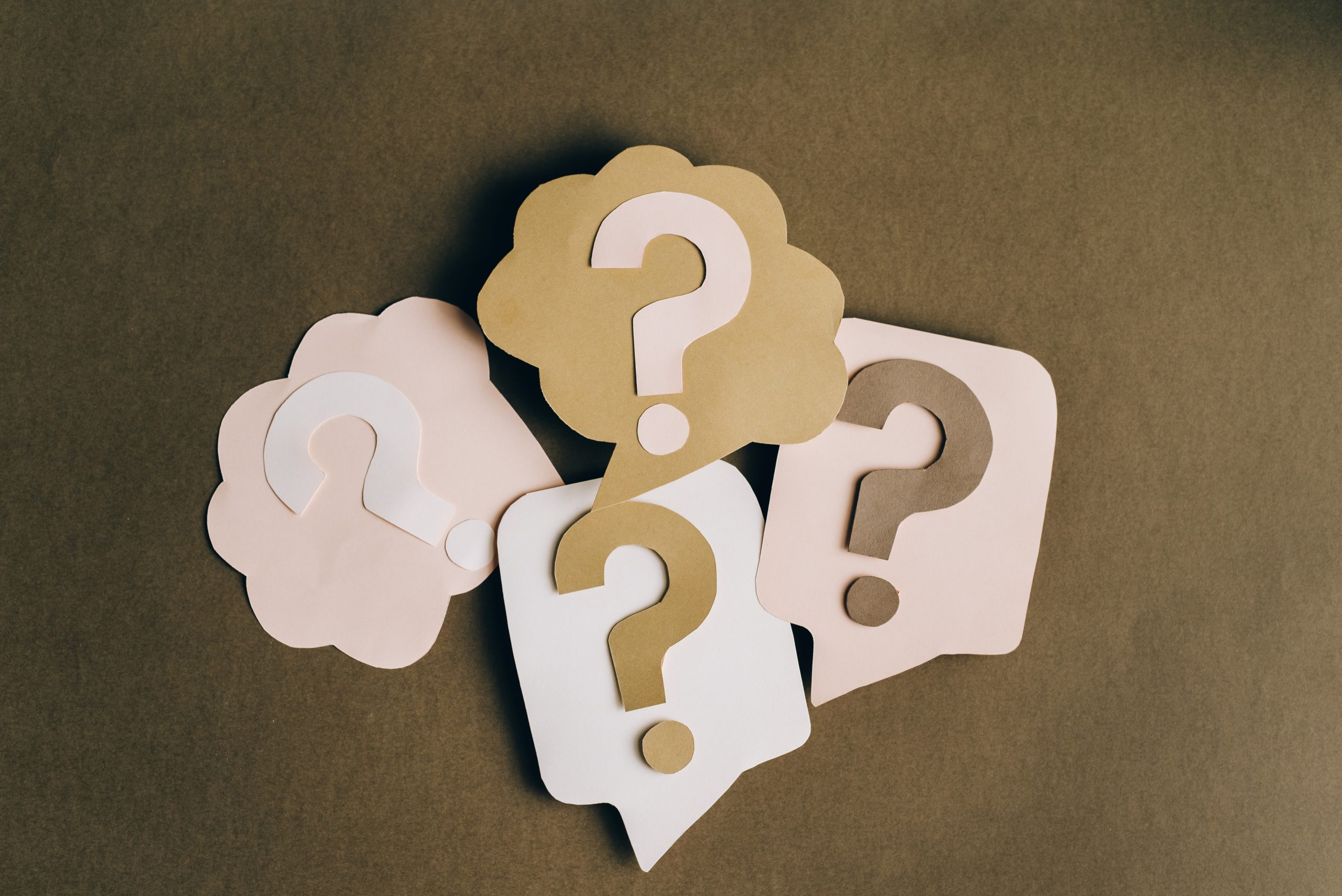 Question Marks on speech and thought bubbles - cardboard cutouts - decorative image
